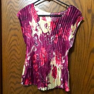 Hand made accordion style material that makes this fit a variety of sizes